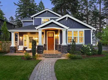 house with red door in evening
